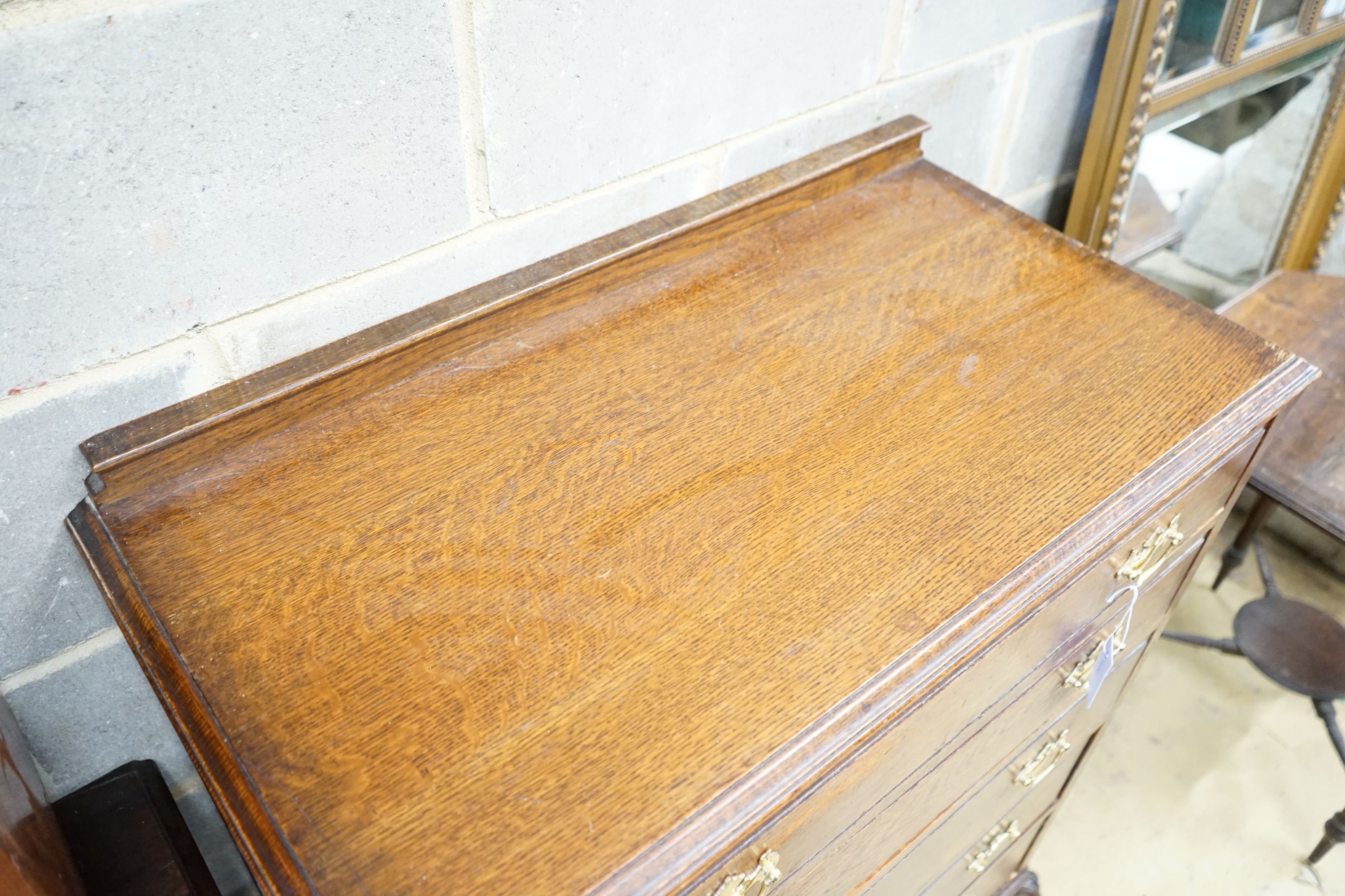 A 1920s oak chest of five drawers, width 89cm, depth 46cm, height 110cm